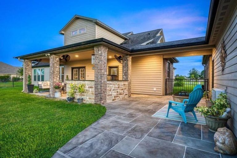 Covered patio attached to the back of a Houston home