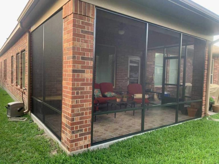 Screened patio enclosure built onto the back of a Houston home