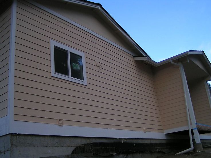New siding on the exterior wall of a Houston house