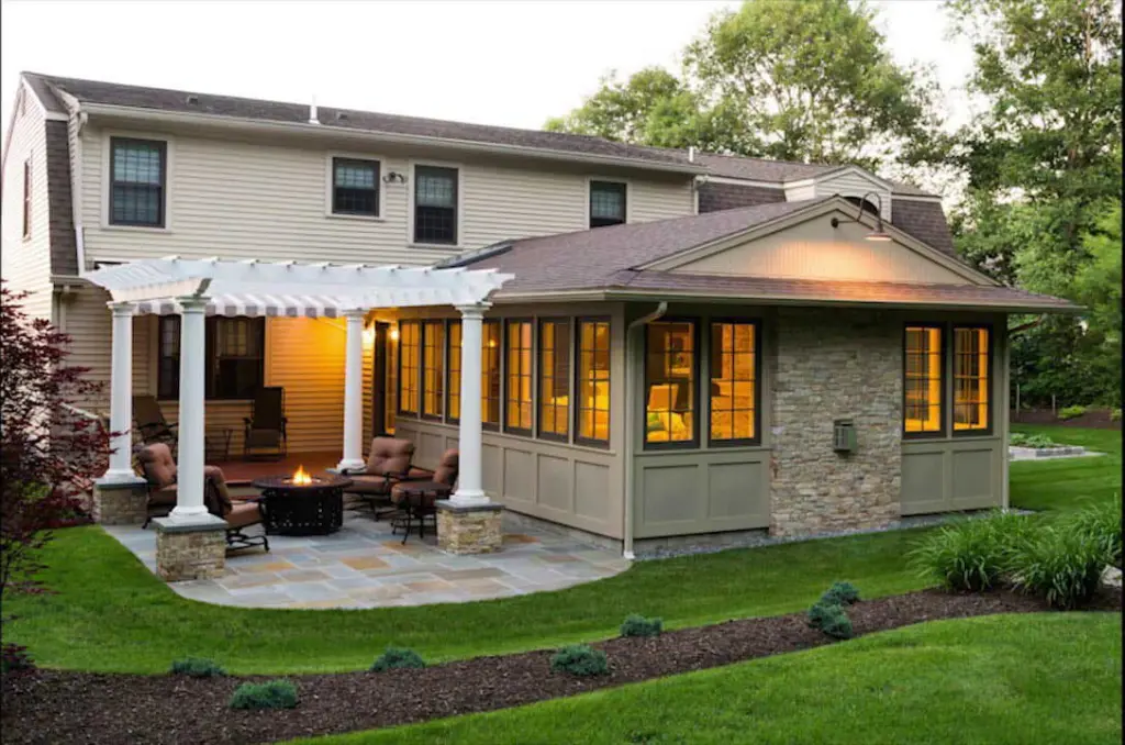 Custom pergola over a patio and seating area at a Houston home